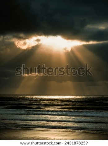 Sun rays make their way through dramatic clouds. Weather turns bad in the evening