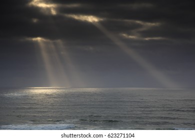 Sun Rays Over The Ocean