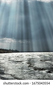 Sun Rays Over The Surface Of The Bay At Noon