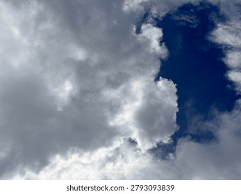 Sun rays piercing through cloud formations, inspiring nature background, vibrant atmospheric photography captured in detailed quality.