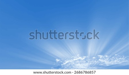 Sun rays shining through blue sky with clouds, bright natural background
