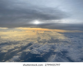 Sun Rays Shining Through Clouds Above the Sky Aerial View