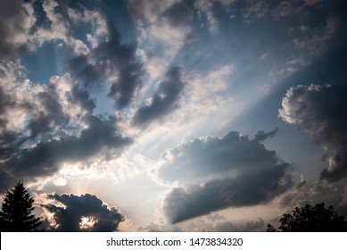 Sun rays shining through dark clouds - spiritual