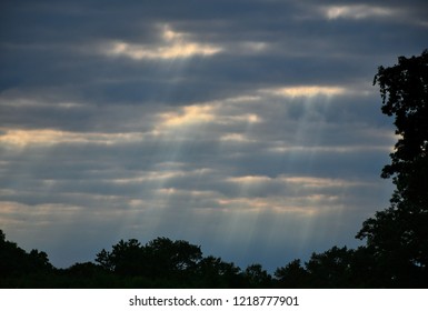 sun rays through the clouds
