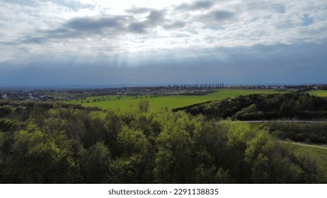 Sun rays through the clouds at Herrington Country Park in Sunderland
