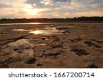 The sun is reflected in the limestone pools along the Ohio River near Louisville, Kentucky