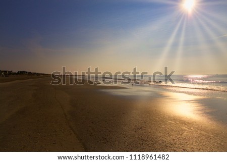 Sun reflected off the ocean at the Jersey Shore.  Avalon, New Jersey.