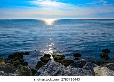 Sun reflection looking over the ocean 