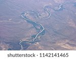 Sun reflection on winding river