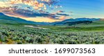 The sun rises over the Lamar Valley near the northeast entrance of Yellowstone National Park in Wyoming.