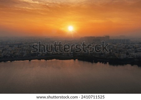 sun rises over Madiwala Lake in Bangalore, India