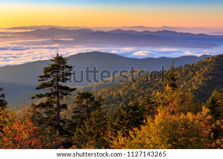 The sun rises over the Smoky Mountains at Clingman's Dome in Great Smoky Mountains National Park, Tennessee