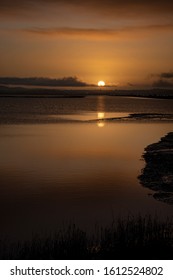 Sun Rising In The Marsh Lands In Vallejo, Ca. 