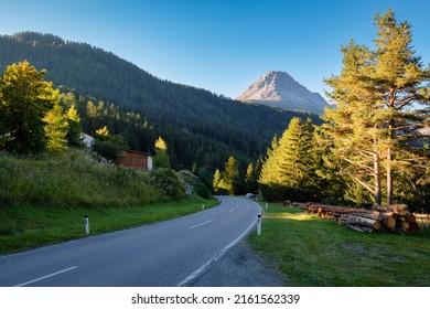 The sun is rising on a autumn morning at mountain pass Norbertshöhe (Tyrol, Austria), that offers a gorgeous view into the Swiss Lower Engadine Valley. It's near the Austria-Switzerland border.