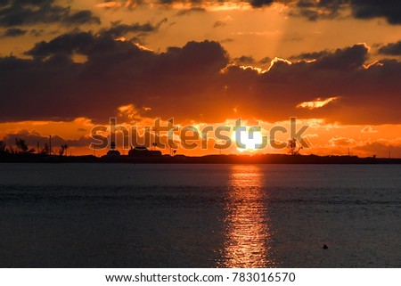 Image, Stock Photo sun-yellow houses are reflected in a stream…