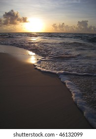 Sun Rising Over Pink Sand Beach In Bermuda