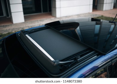 Sun Roof With Sunshade. Panoramic Hatchback Car Roof Is Open. Insect Screen