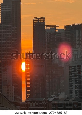 Sun set between buildings june 14 2026 makati city Philippines 