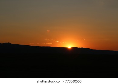 sun set over mountains