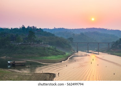 sun set view on the river and bridge, reflect on the river