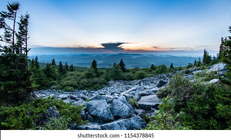 The Sun Sets Behind A Giant Thunderstorm Cloud In The Appalachian Mountains Seen From Spruce Knob In West Virginia