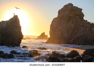 The Sun Sets At El Matador Beach In Malibu, California.