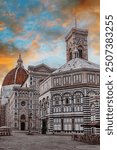 The sun sets illuminat the majestic cathedral Florence Cathedral, Cattedrale di Santa Maria del Fiore , enticing visitors to stroll through ancient streets Florence, Italy