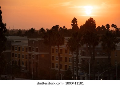 The Sun Sets On The Anaheim, California Skyline.