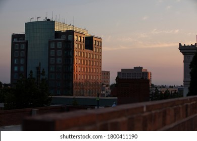 The Sun Sets On The Anaheim, California Skyline.