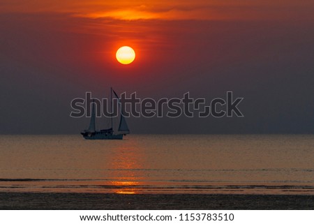 The sun sets on Mindi beach in Darwin, Australia