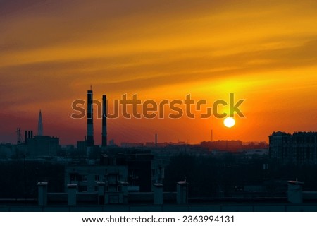 The sun sets over the horizon. Twilight over the city.