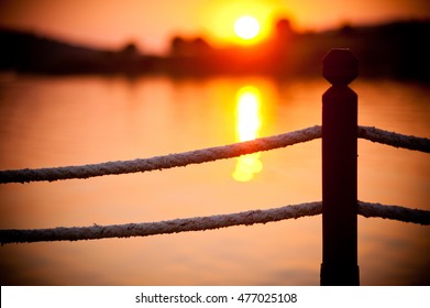 The sun sets over the mountain