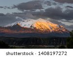 The Sun Sets Over Mt. Sopris as Seen From Carbondale, Colorado in the Roaring Fork Valley in the Rocky Mountains.  