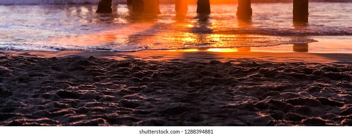 Sun Sets Over The Pacific Ocean In Marina Del Rey And Venice Beach Pier