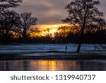 the sun sets at the park