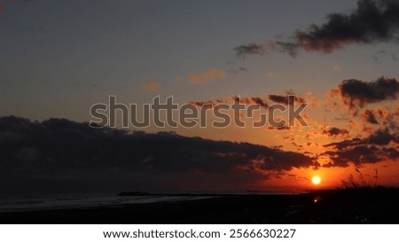 The sun sets in the sea.