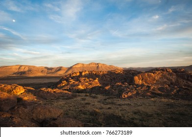 The Sun Setting Across The Mountains At Hueco Tanks In El Paso, Texas. 