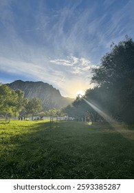 Sun setting behind the mountains. 