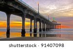 sun setting by the manhattan beach pier,california. this is an HDR image composed of 3 shots processed with photomatix pro 4.