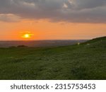 Sun setting down scenery in the hills valley