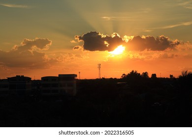 the sun is setting in the evening