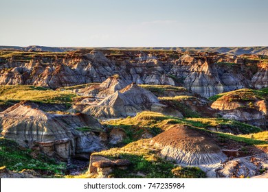 Sun setting over Dinosaur Provincial Park, a UNESCO World Heritage Site in Alberta, Canada. The Alberta badlands is well known for being one of the richest dinosaur fossil locales in the world.