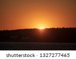 Sun setting over hillside in Gloucester, Massachusetts. Captured the last bit of the sunset.