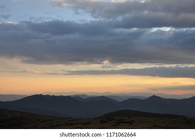 Sun setting over mountains 