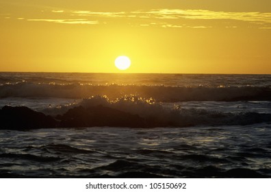Sun Setting Over The Ocean
