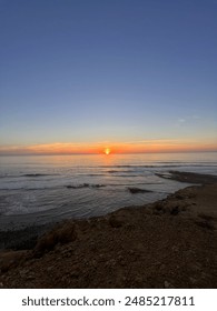 Sun setting over the ocean