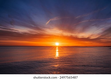 sun setting over the ocean