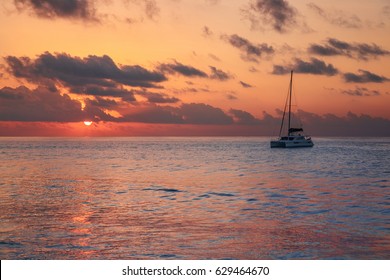 Sun setting over ocean