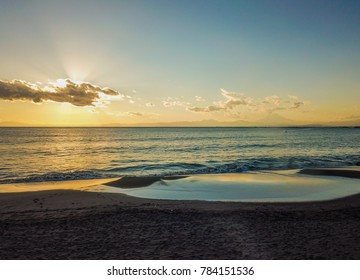 sun setting over the ocean