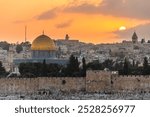 The sun setting over the Old City of Jerusalem